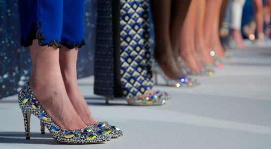 The collection was designed by Rozae Nichols and featured riveting, kaleidoscopic prints and, our favorite, glittering shoes