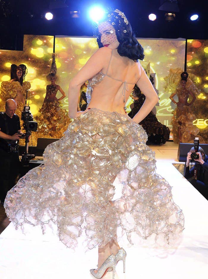 Dita Von Teese models a dress made of biscuit tins during the Lambertz Monday Night Party at Alter Wartesaal in Cologne
