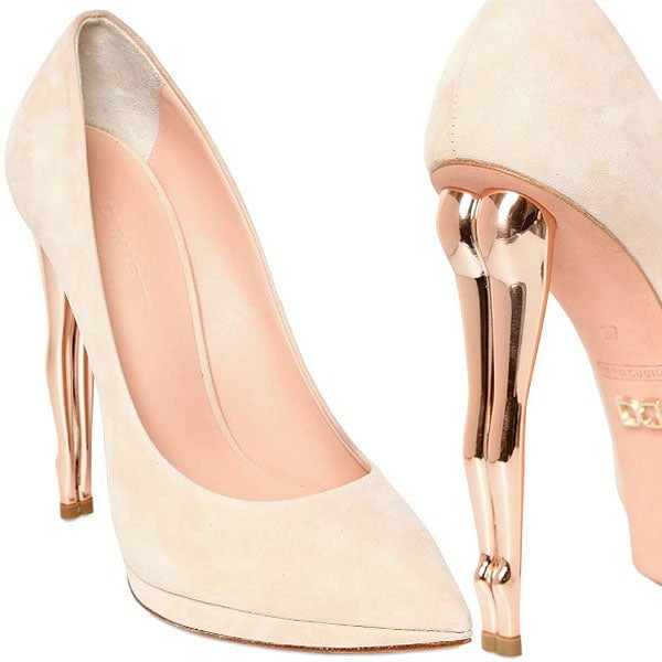 These elegant Dukas Pumps come with an unexpected twist - their heels are designed to resemble doll legs and a butt