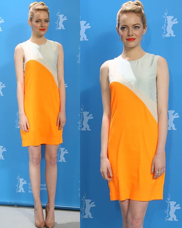 Emma Stone dazzled at the Berlinale Film Festival in a modified Stella McCartney Spring 2013 silk dress, complemented by Christian Louboutin pumps, Jamie Wolf earrings, and a Melinda Maria ring, elegantly modernizing the original design for 'The Croods' photocall in Berlin, 2013