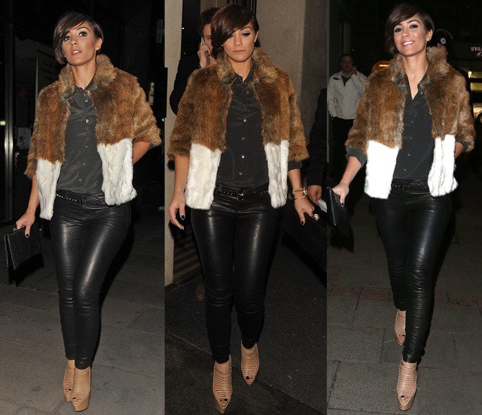 Frankie Sandford wore a stylish outfit consisting of leather pants, a black silk blouse, and a two-toned fur jacket, completed with a black clutch