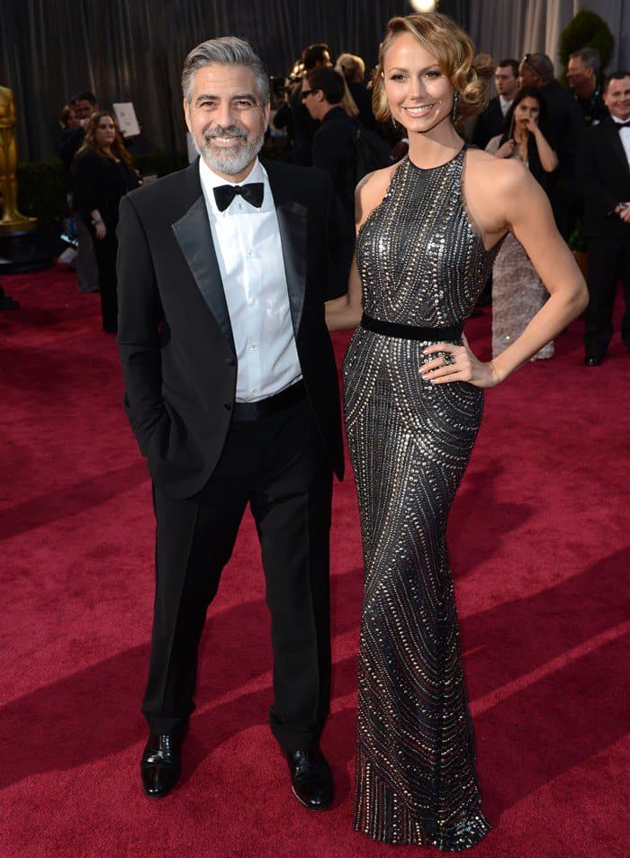 George Clooney and Stacy Keibler arrive at the 85th Academy Awards ceremony