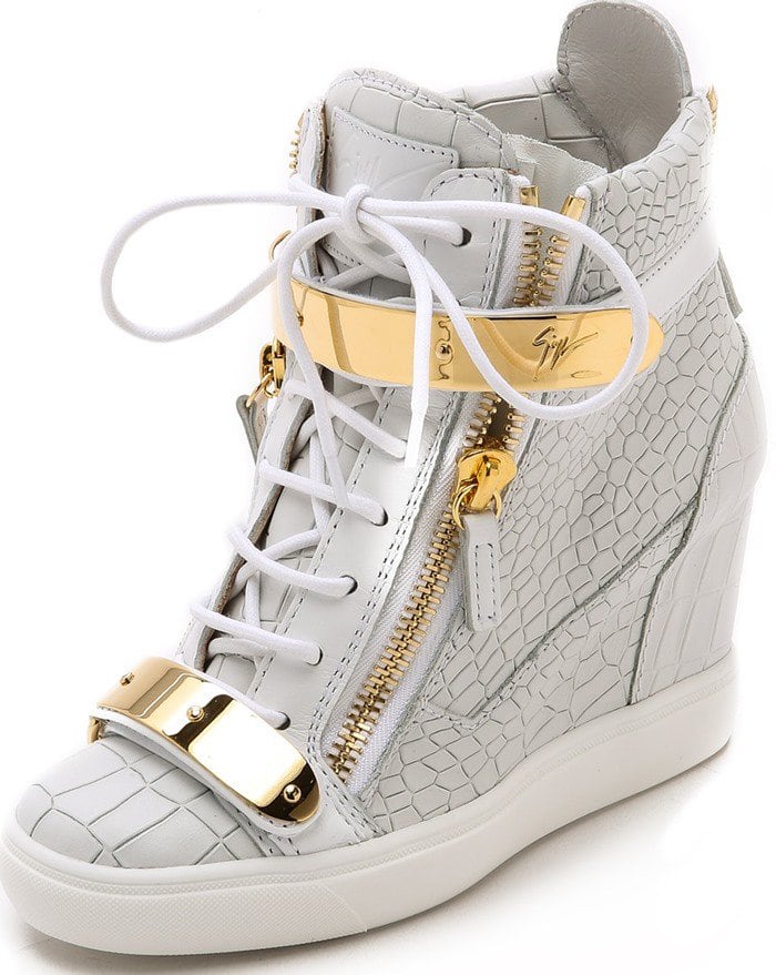 These luxe croc-embossed sneakers by Giuseppe Zanotti are punctuated with polished gold-tone hardware