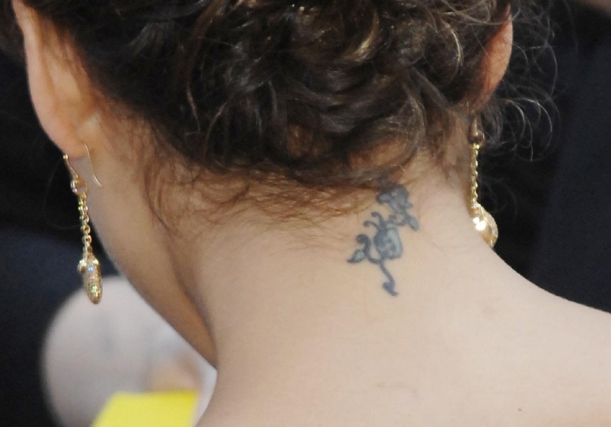 Jessica Alba had flowers inked on the back of her neck but got the tattoo removed in 2009