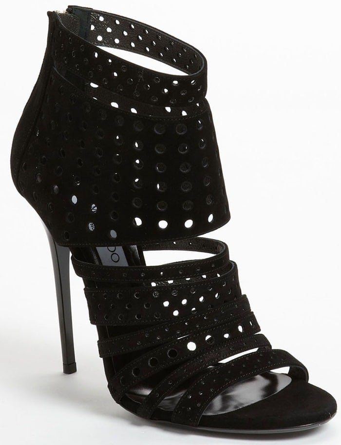 A futuristic fusion of mod dots and contemporary cutouts creates head-turning impact for a stunning stiletto sandal