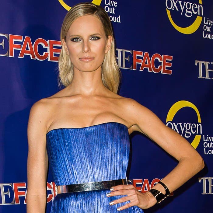 Karolina Kurkova captivates in a bold, fringed Dimitri dress, showcasing her stunning silhouette