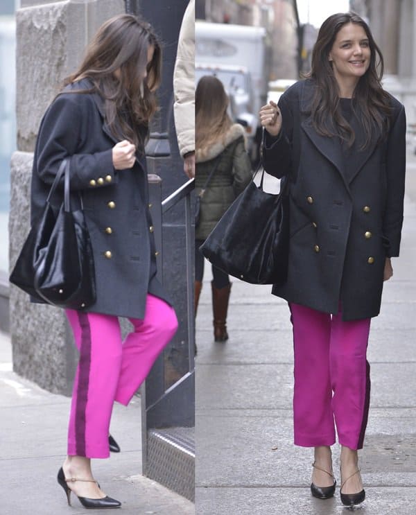On February 22, 2013, in NYC, Katie Holmes was seen wearing a sophisticated ensemble featuring Isabel Marant David double-breasted coat, Maison Martin Margiela cut-out leather pumps, and accessorizing with a CH by Carolina Herrera bag in black