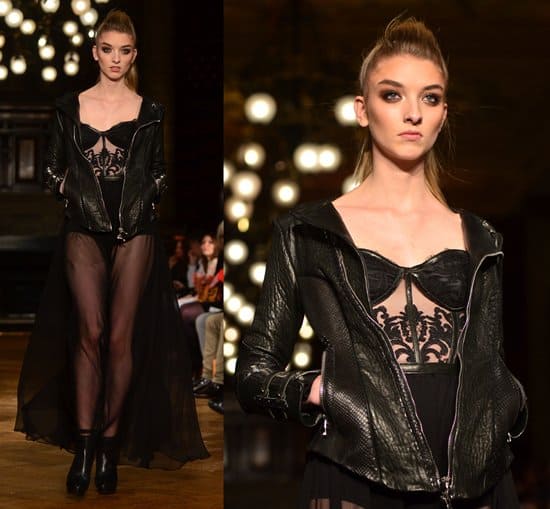 Enchanting Elegance on Display: A model graces the runway in a Kristian Aadnevik masterpiece at London Fashion Week AW13, capturing the essence of dark romance and intricate design at The Royal Horseguards Hotel, London, February 17, 2013