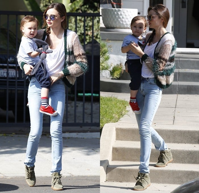 Miranda Kerr flaunted her legs in skinny jeans and Isabel Marant's Bobby sneakers