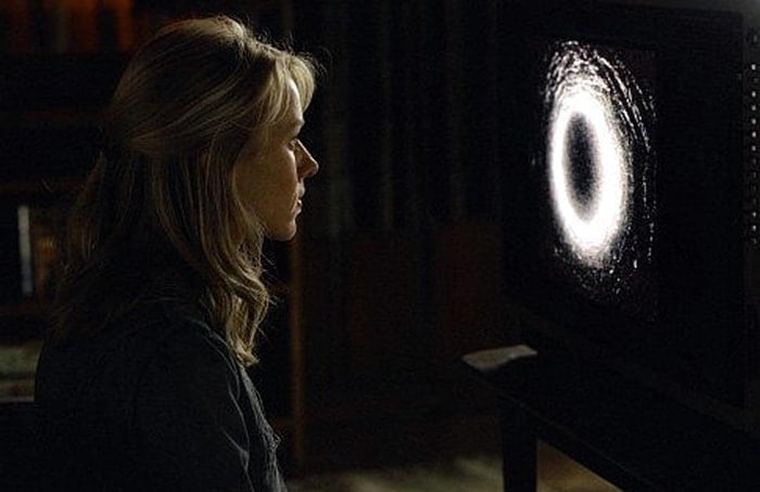 Naomi Watts as Rachel Keller watches the cursed videotape in 2002 American supernatural horror film The Ring