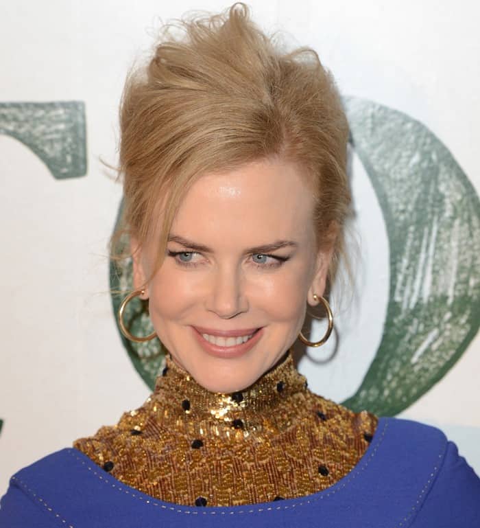 Nicole Kidman in a blue dress at a screening of her movie Stoker