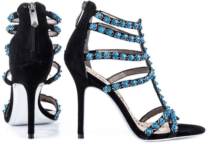 Geometric beads traces the precision straps of a striking suede sandal balanced atop a slim heel