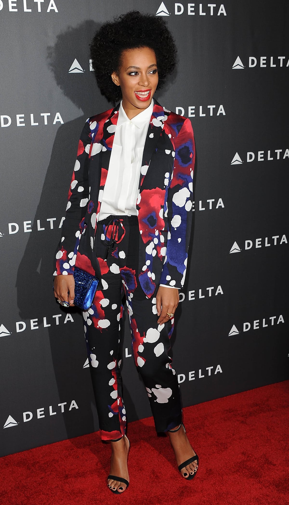 Solange Knowles attended the Grammy Week LA Music Industry reception in Los Angeles wearing a vibrant, color-rich Diane von Furstenberg suit from the Spring 2013 collection