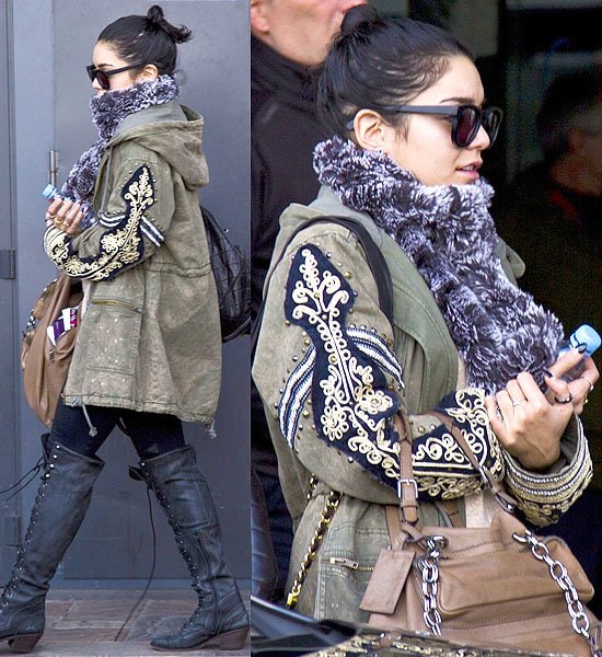 Vanessa Hudgens showcased a chic ensemble in Rome, Italy, on February 22, 2013, featuring Wildfox Sun classic fox sunglasses in matte black, Jeffrey Campbell Joe lace-up boots, Bleulab Detour leggings in black, a Free People Golden Quills military parka, a Chanel black quilted leather backpack, and a Dolce & Gabbana Miss Pocket leather shoulder bag handbag tote