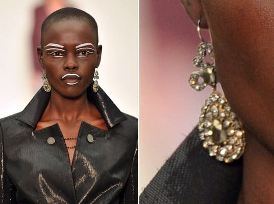 A model wears Vivienne Westwood crystal drop earrings
