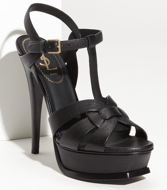 An icon since it first debuted on the runway, Saint Laurent's stylishly strappy Tribute sandal is lifted by a soaring tapered heel and bold platform sole
