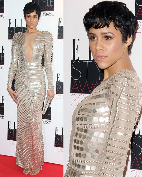 Zawe Ashton makes a bold statement in an embellished Julien Macdonald dress with a plunging sheer neckline, accented by a silver Jimmy Choo clutch and Louboutin heels