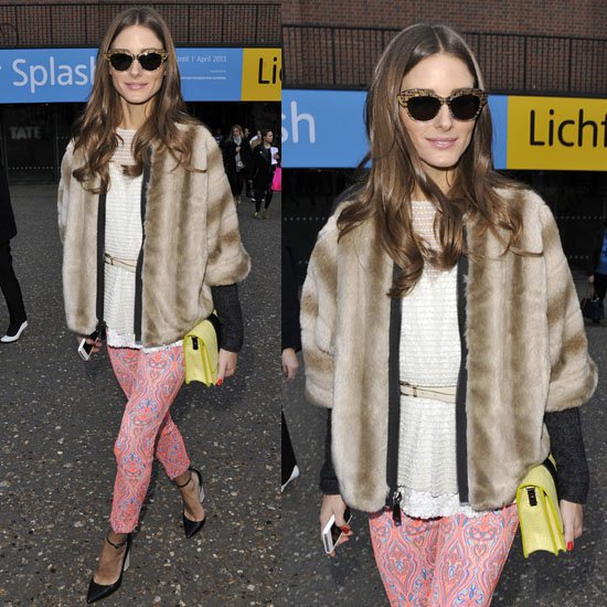 Olivia Palermo's ensemble features vibrant pink brocade pants paired with a dazzling sequin top and a chic brown faux fur jacket by Tibi, accessorized with Monika Chiang pumps and a statement yellow purse