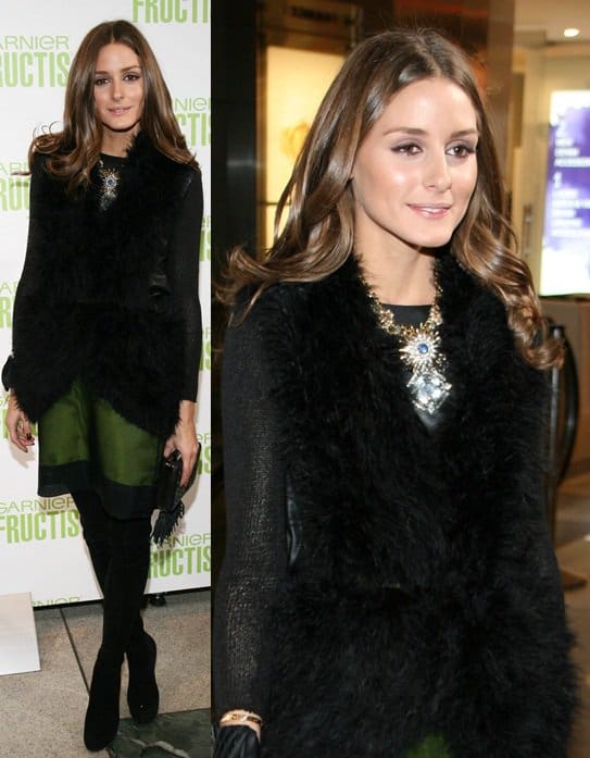 Olivia Palermo wears Haute Hippie's marabou feather-embellished champagne satin vest and a Lulu Frost necklace