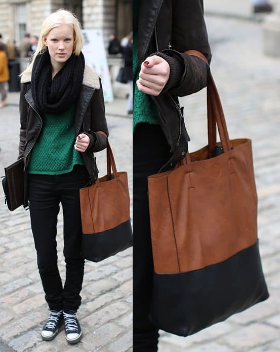 Effortlessly casual, this two-tone tote adds a polished touch to a cozy green knit, leather jacket, and classic sneakers for street-style perfection