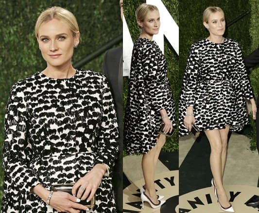 Diane Kruger showcases her fashion-forward style in a unique Giambattista Valli dress, proving her sartorial prowess at the 2013 Vanity Fair Oscar Party