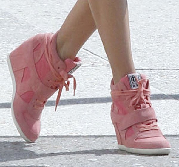 Alessandra Ambrosio wears pink "Bowie" wedge sneakers to a Santa Monica photoshoot