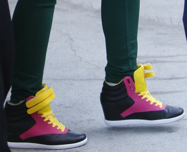 Alicia Keys showcases her vibrant Reebok wedge sneakers