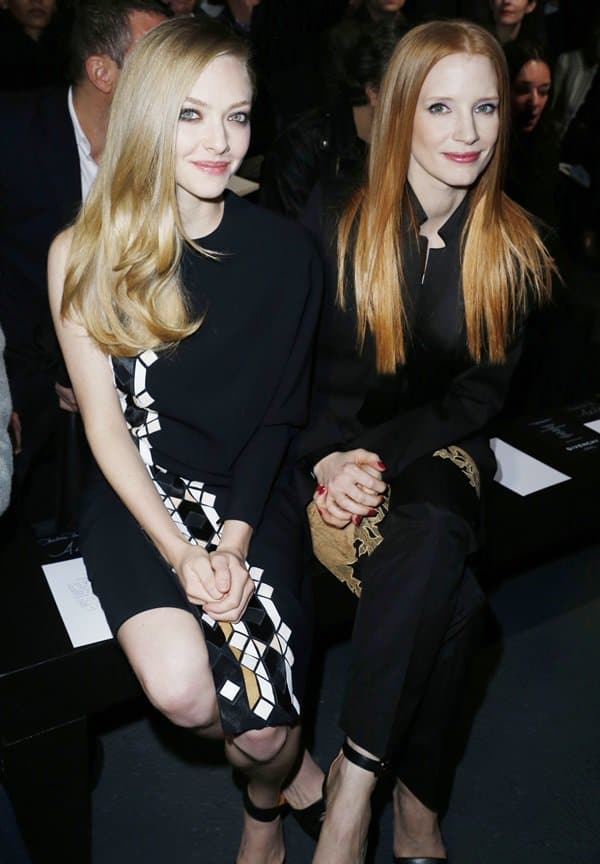 Amanda Seyfried and Jessica Chastain attend Givenchy Fall/Winter 2013 Ready-to-Wear show as part of Paris Fashion Week on March 3, 2013, in Paris, France