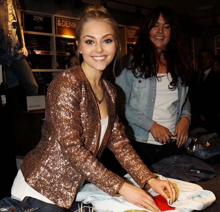 AnnaSophia Robb wears a copper-colored sequined jacket at the H&M "Denim Days" event