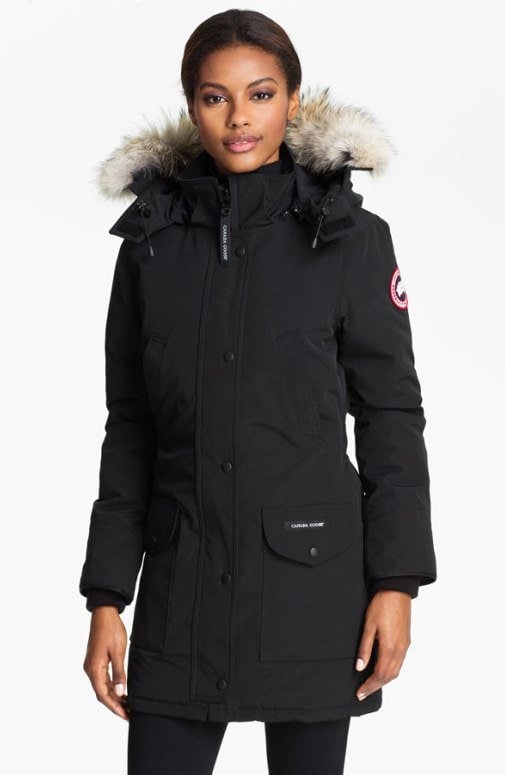 A cozy genuine coyote fur ruff trims the hood of a water-repellent parka cut for a shapely, flattering fit and filled with lofty duck down for reliable warmth without extra bulk