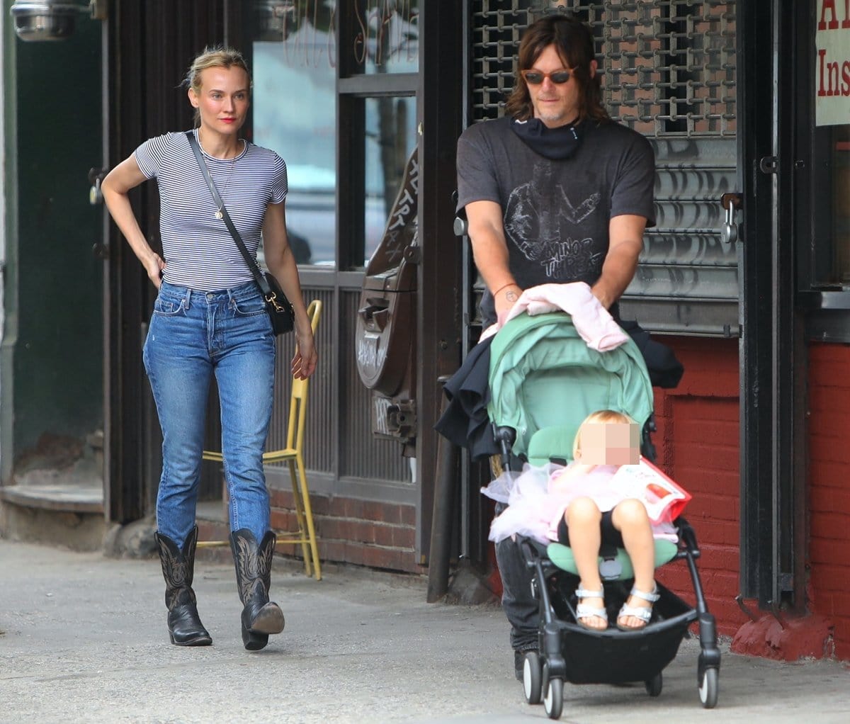 Diane Kruger and Norman Reedus are seen with their daughter