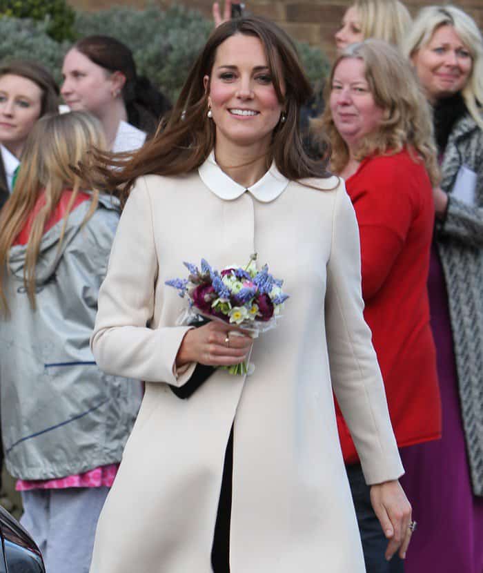 Kate Middleton donned a cream A-line "Redgrave" coat by the designer label Goat