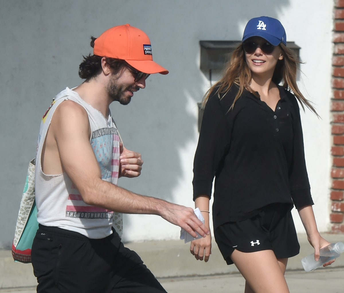 Elizabeth Olsen takes a long walk with her boyfriend Robbie Arnett in Los Angeles