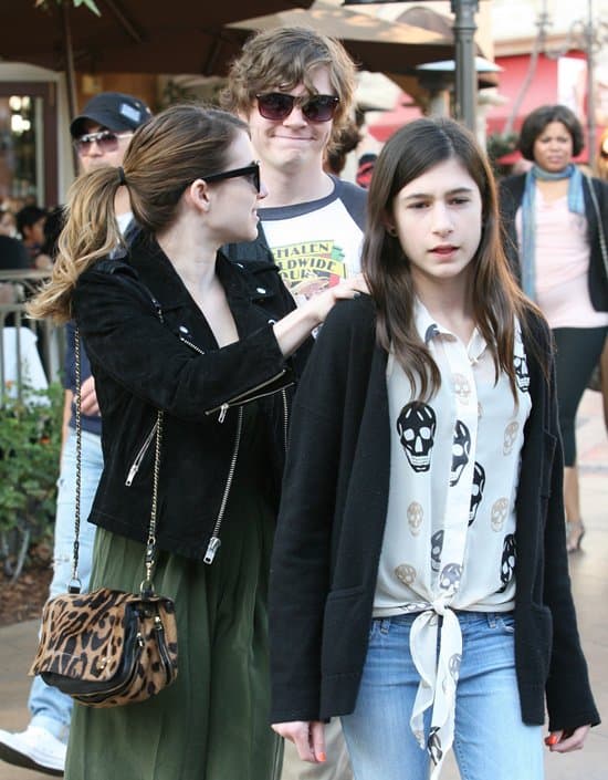 Emma with her boyfriend Evan Peters and her half-sister Grace Nickels