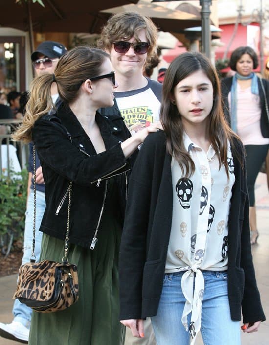 Emma with her boyfriend Evan Peters and her half-sister Grace Nickels