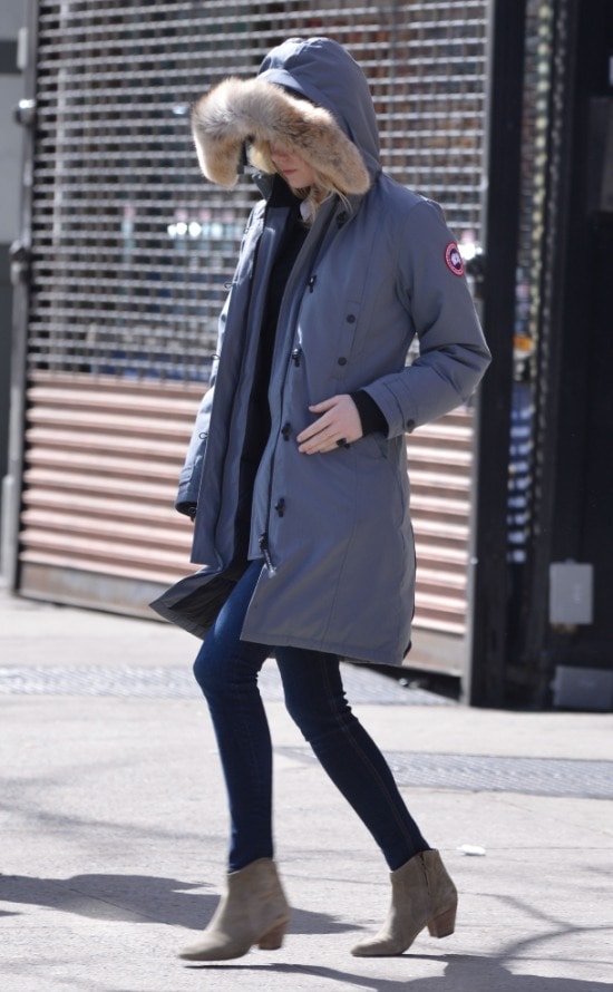 Emma Stone hid under a fur-trimmed Canada Goose jacket