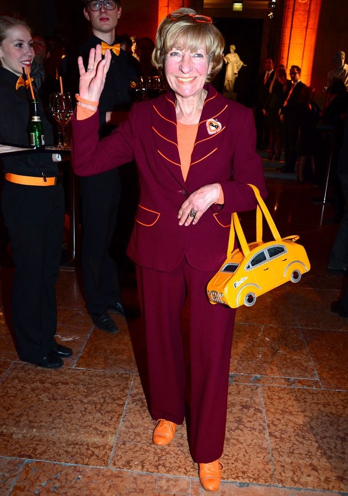 Smiling brightly, Heidi Hetzer attends the Sixt party The Night The Winners Meet at Baerensaal