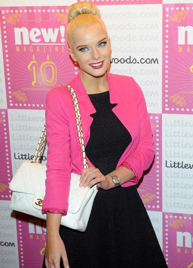 Captured at Gilgamesh during New! Magazine's 10th birthday celebration, Helen Flanagan embodies glamour with her pink and black attire, complemented by a classic white Chanel purse