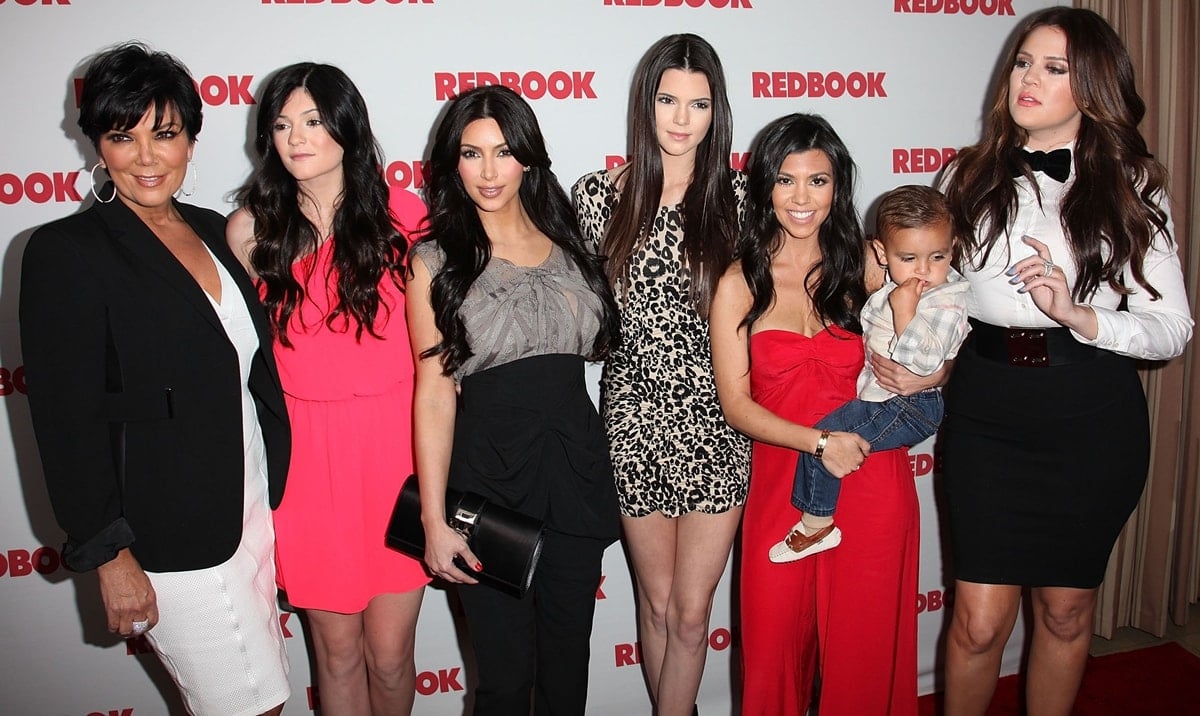 Kourtney Kardashian, embracing her unique stature with grace, stands as the shortest in the Kardashian-Jenner lineup