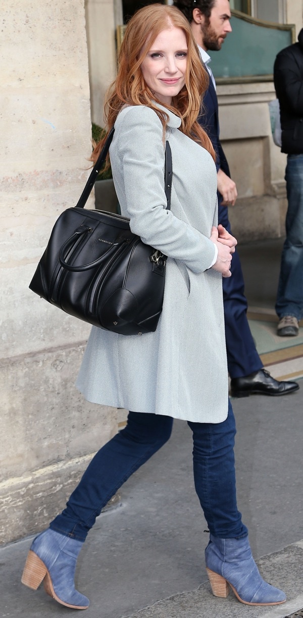 Jessica Chastain leaves her red hair down as she departs the Meurice Hotel in Paris