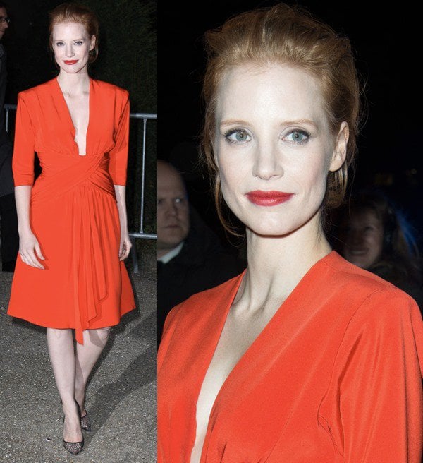 Jessica Chastain chose a plunging red dress that beautifully complemented her fair complexion at the Saint Laurent Fall/Winter 2013 Ready-to-Wear show in Paris
