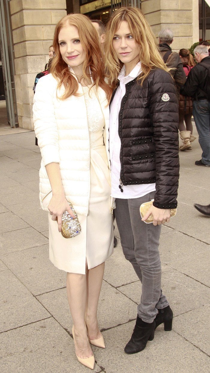 Jessica Chastain wears a white quilted nylon jacket by Moncler