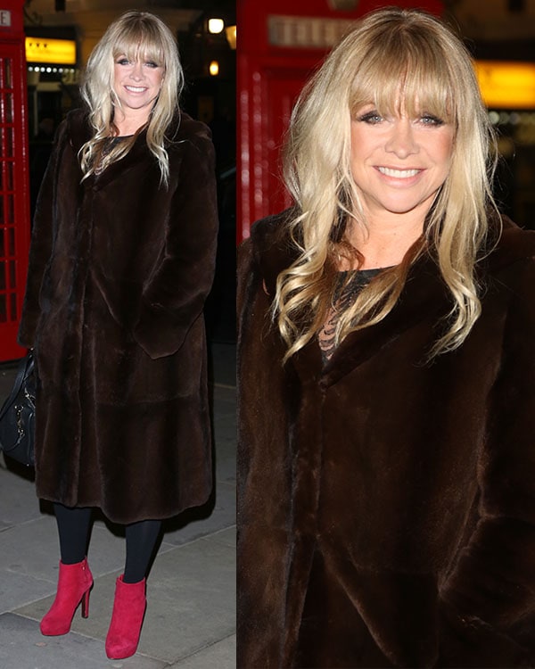 Jo Wood makes a bold statement in a chic dark brown fur coat paired with striking red ankle boots