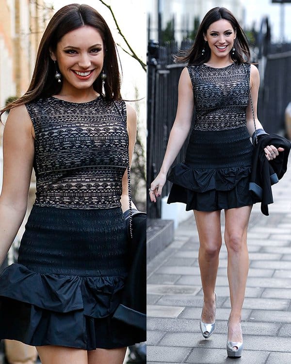 Kelly Brook is seen leaving her house, styled in a revealing skater dress with a sheer lace bodice and a short ruffled skirt, paired with a blazer and towering silver platform pumps