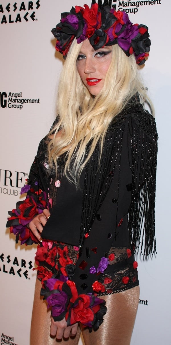 Kesha wears a flower-adorned corset with matching panties at Pure Nightclub's anniversary celebration