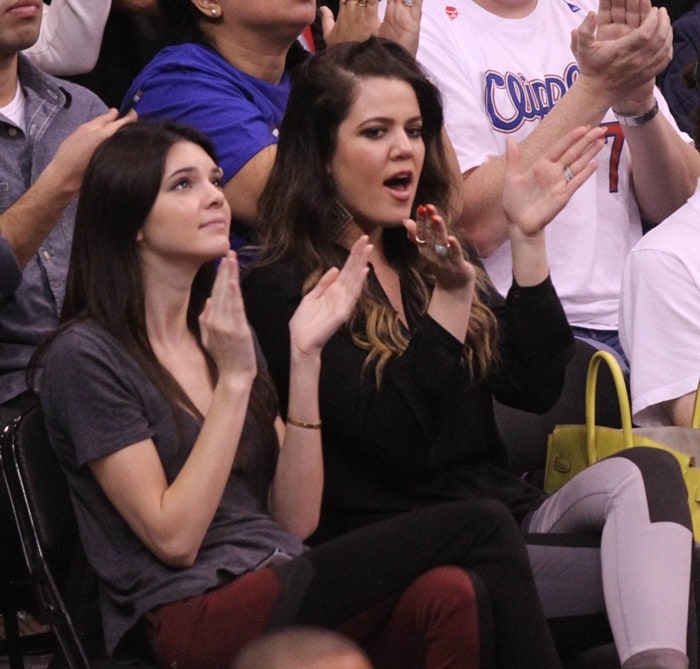 Khloé Kardashian and Kendall Jenner watching the LA Clippers vs. Milwaukee Bucks game at the Staples Center in Los Angeles on March 6, 2013