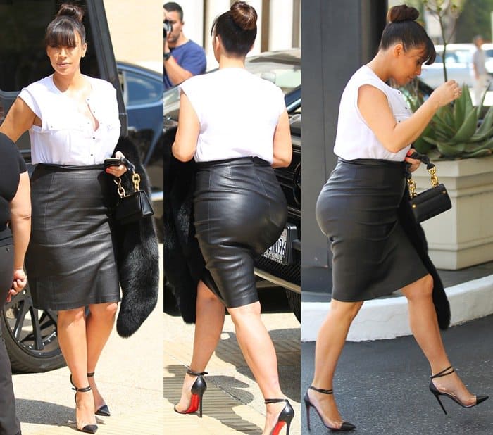 Kim Kardashian was spotted in Beverly Hills on March 21, 2013, wearing a chic A.L.C. white sleeveless cargo blouse, paired with a sleek Vince black leather pencil skirt and Christian Louboutin Un Bout stilettos