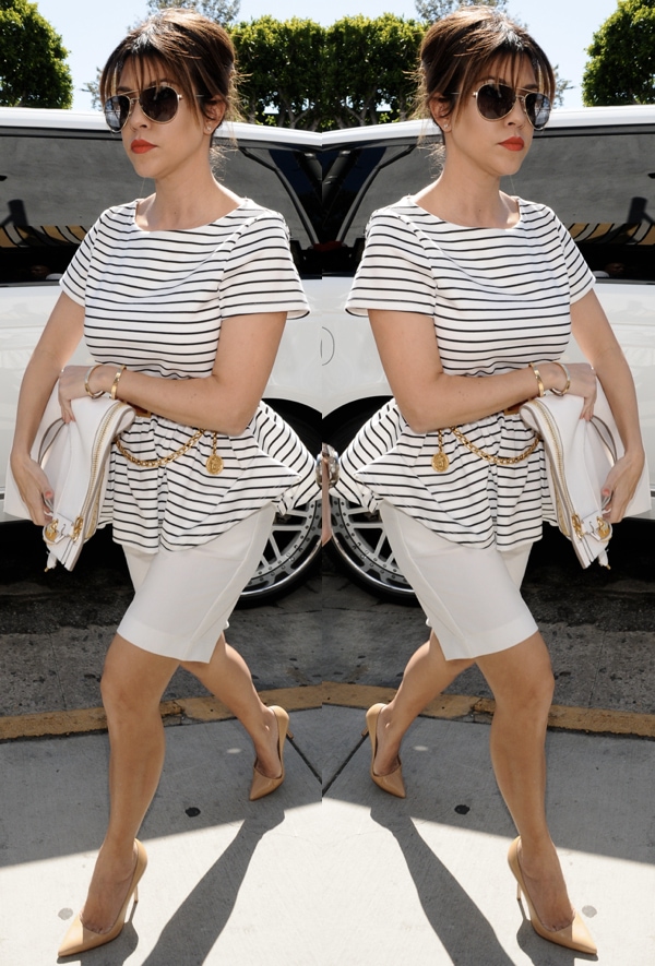 Kourtney Kardashian toted a Tom Ford Alix fold-over carry bag in ivory and rocked a vintage Chanel belt