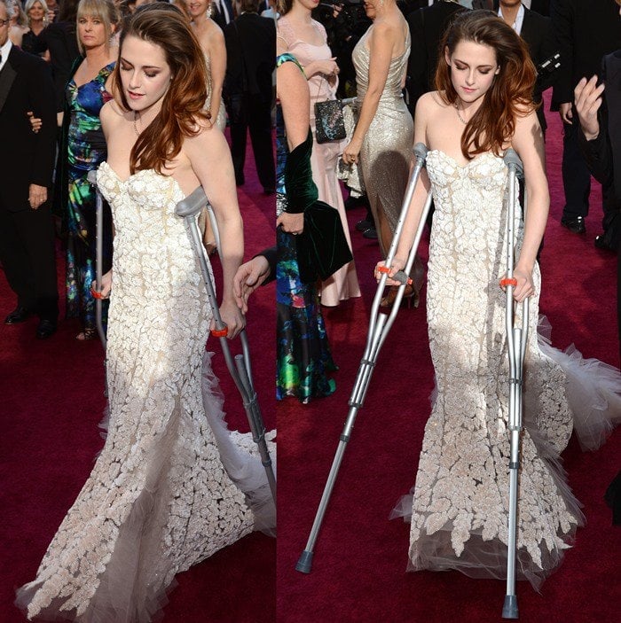 Accidentally stepping on glass before the ceremony, Kristen Stewart wore crutches with her floor-length embroidered Reem Acra gown on the red carpet