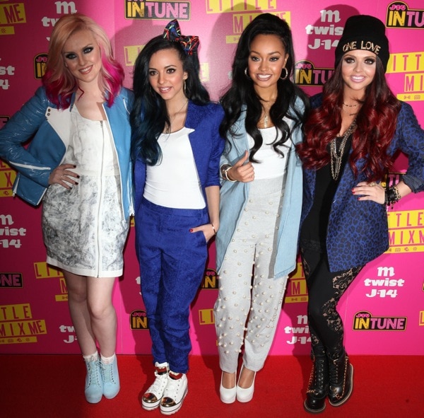 Little Mix rocks a mix of edgy and playful outfits, pairing bold footwear with statement pieces at their debut event